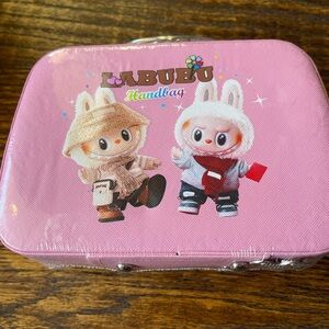 Pink Labubu kids makeup set.